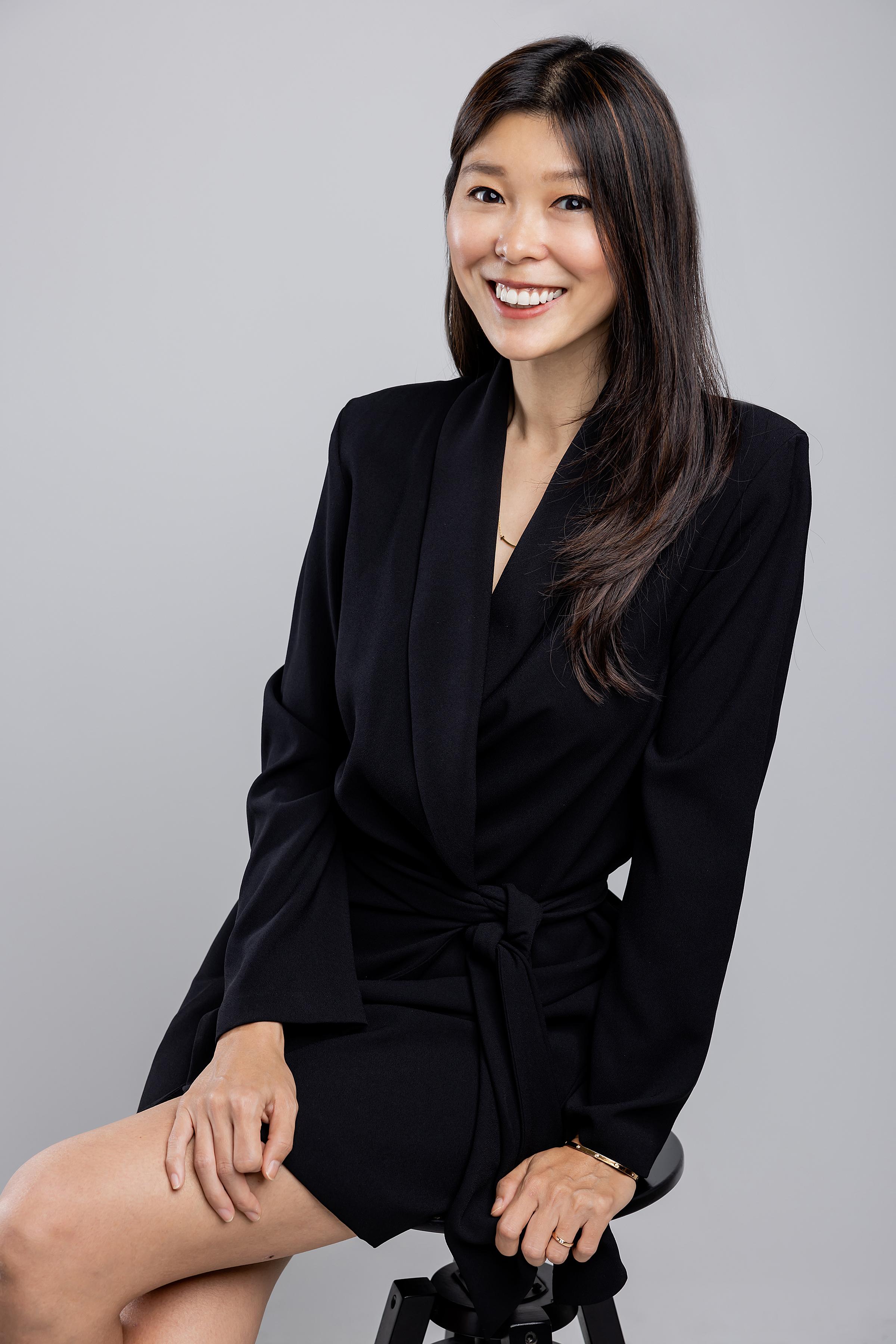 Hazel Han, CEO of Ember Creatives, wearing black